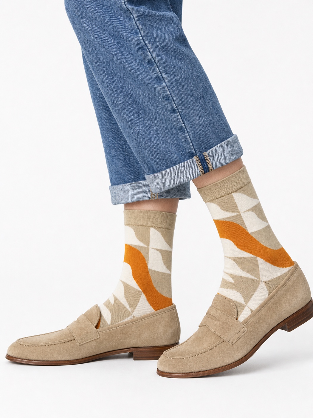 Cream and oat Nollaknit socks with amber geometric waves