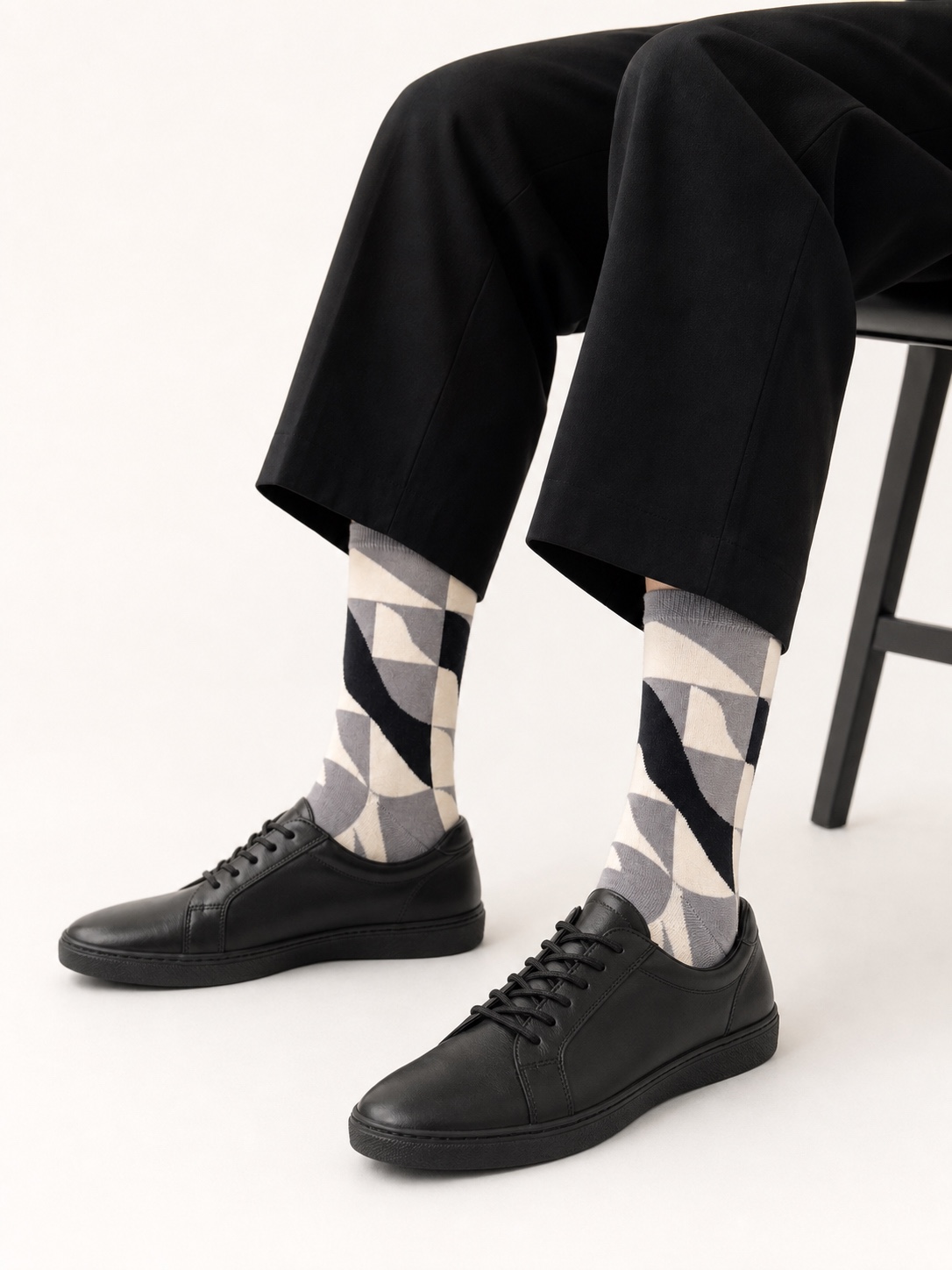 Cream, grey and black Nollaknit socks with graphic waves